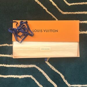 Louis Vuitton box and ribbon
